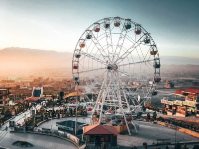 always-fun-see-tall-ferris-wheel-when-approaching-park-holidays-full-happy-people_181624-2216